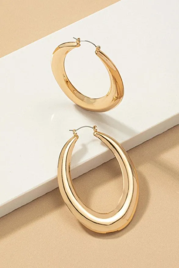 Large puffy hollow oval hoop earrings