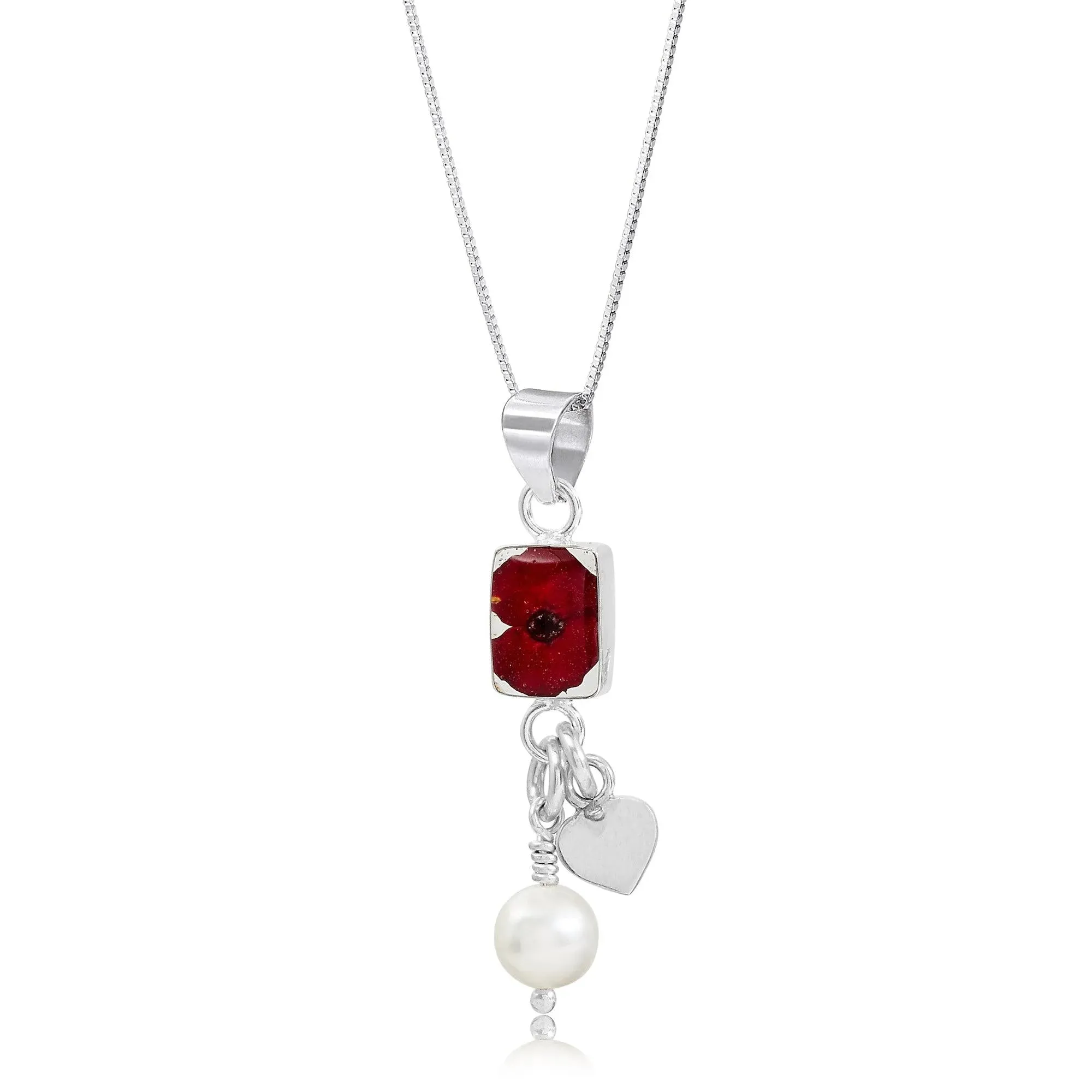 Poppy necklace by  Shrieking Violet® Sterling silver charm pendant with a single mini poppy (Euphorbia milii) & a cultured pearl.